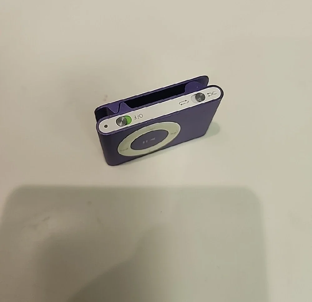 Apple iPod Shuffle 2nd Generation in purple.
